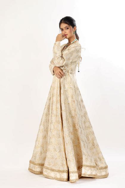 MEKSHA - Ivory and gold Angrakha Kurta gown with attached tassels – Saangi