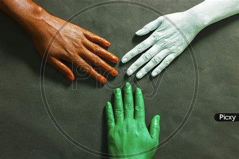 Image of three hands are painted with three colors,saffron,white and ...