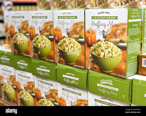 Packages of gluten free stuffing mix fill a shelf at a local Trader Joe ...