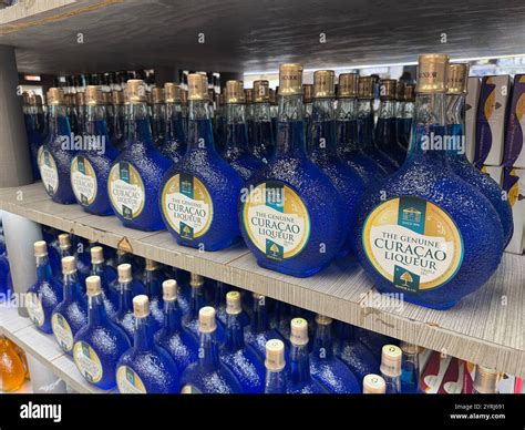 Bottles of Blue Curacao liqueur on sale at a duty free store at Curacao ...