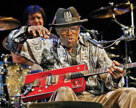 Download Legendary Musician Bo Diddley Showcasing His Unique Guitar ...