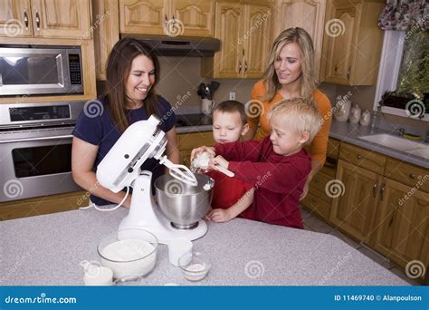 Moms and sons baking stock photo. Image of happy, batter - 11469740
