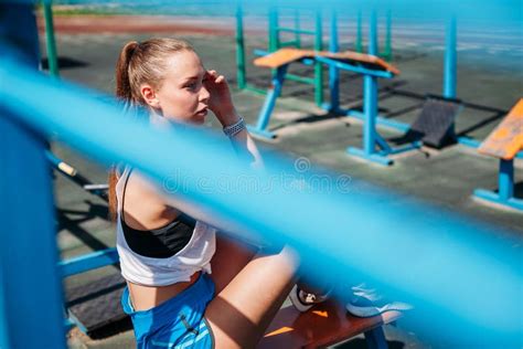 Girl in sports set slowly undresses and sits on the dick