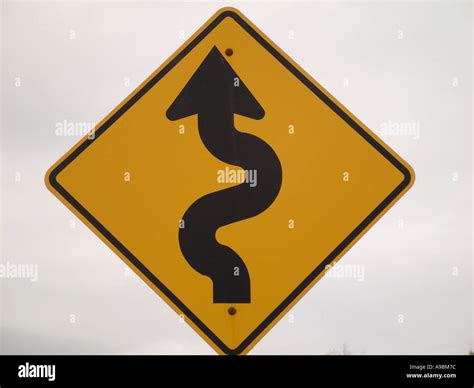AJD42598, road sign, Winding Road Ahead Stock Photo - Alamy