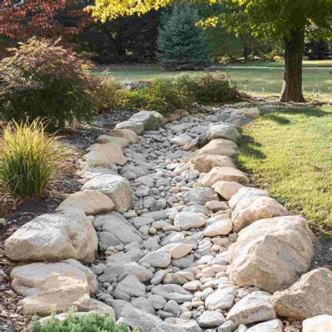 10 Easy & Stylish Dry River Bed Landscaping Ideas You’ll Love