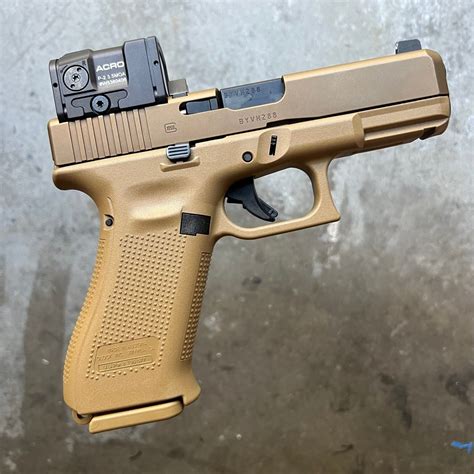 GLOCK 19X with AIMPOINT ACRO P2, suppressor height sights, and ...