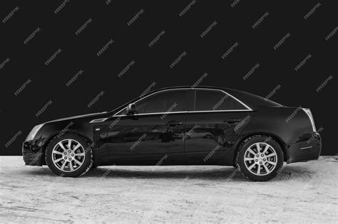 Premium Photo | Black sedan car on black isolated background