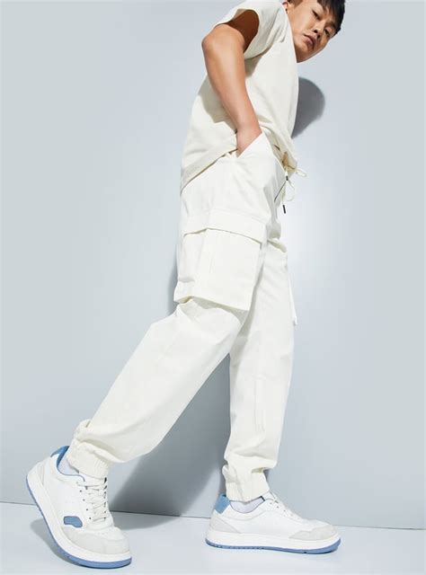 Buy URB_N Men Solid Relaxed Fit Cargo Joggers Online at just Rs. 999.0 ...