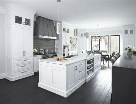 Dark ebony hardwood floors contrast with shades of white | Kitchen ...