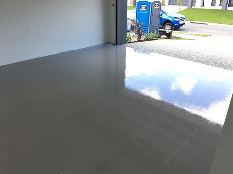 Glossy grey epoxy flooring installation at North Lakes for a Sunshine ...