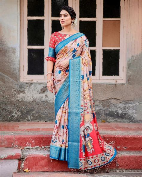 Beige and Red Tussar Silk Saree with Divine Motifs and Flora
