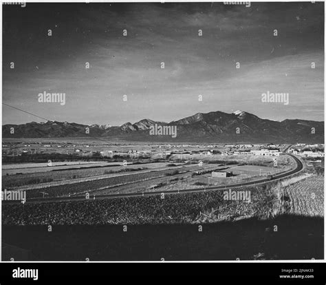 Taos County, New Mexico. Road into Taos, seen from Llano Quemado. Note ...