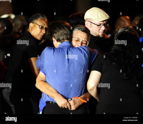 The Rev. Lynn Hopkins, left, and Carolyn Bond embrace outside the ...