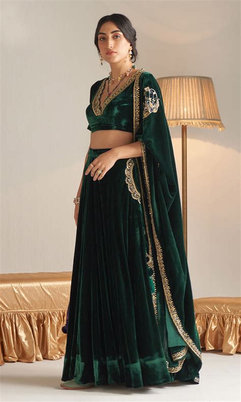 Khizaan Embroidered Emerald Green velvet Lehenga with blouse and shawl ...