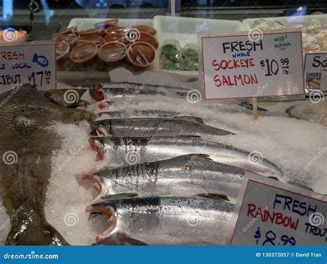 Fresh Sockeye Salmon, Rainbow Trout, and Halibut and Sale Signs and ...