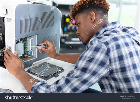 Image result for An Engineer Fixing Machine