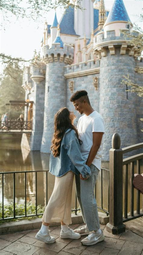 Disney couple picture ideas infront of the castle – Artofit