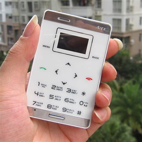新款 AIEK M3 全球首款触控超薄最薄最小袖珍超小MP3音乐卡片手机_tomzhao22
