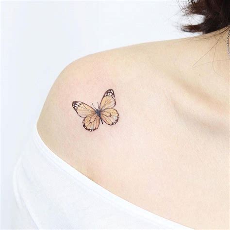 Butterfly Tattoo On Front Shoulder