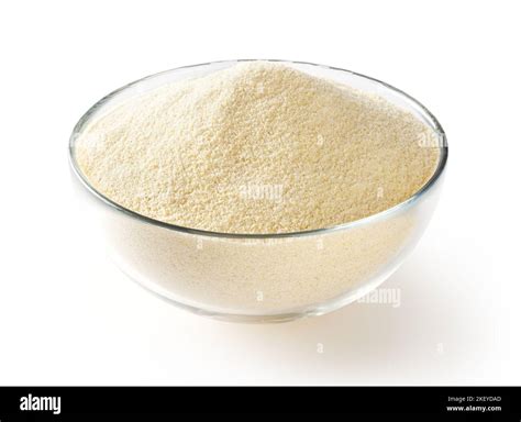 Semolina flour in glass bowl isolated on white background Stock Photo ...