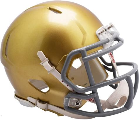 Notre Dame Gold Helmets