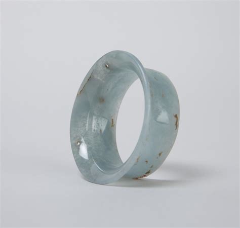 Olmec earspool made of jade. Found in Veracruz, Mexico. 900-600 BCE ...