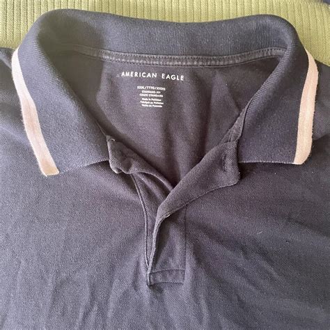 Blue American Eagle Outfitters Polo. White stripes... - Depop