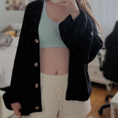 Oversized black cardigan with brown buttons, never... - Depop
