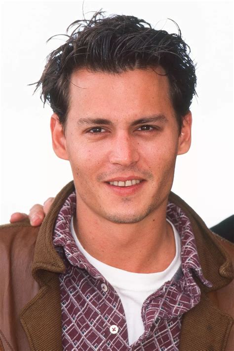 Johnny Depp boasts he's 'proud' of his 'rotting teeth' with 'loads of ...