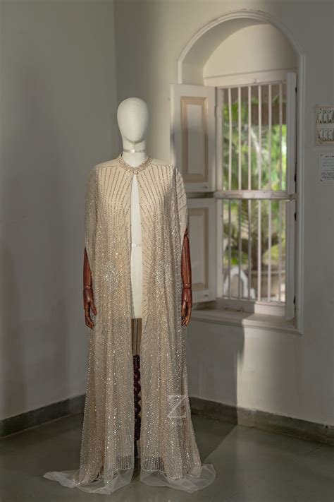 Whispered Glow Buttoned Cape – Z By Zulekha
