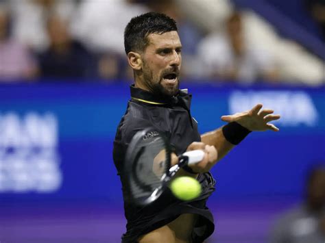Djokovic fights off qualifier to make US Open third round
