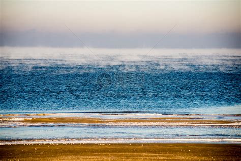 在美丽的阳光下海岸上的沙子和水的特写高清图片下载-正版图片504363808-摄图网