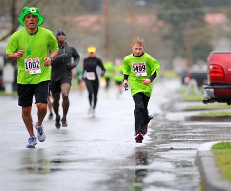 JBLM St. Patty's Day Run: Runners in good spirits despite rainy weather ...