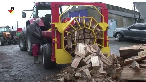 Splitting Firewood Using a Log Splitter 的图像结果