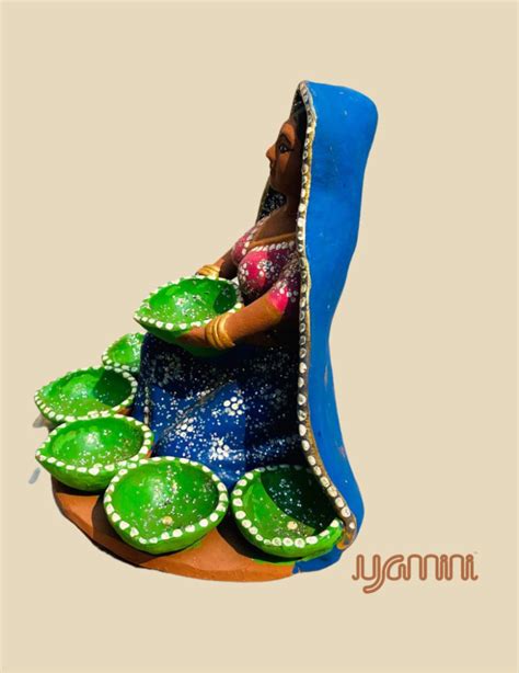 Yamini Designer 7 Diya Village Woman assorted colored clay figurine for ...