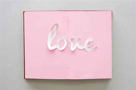 White love inscription on notebook | Free Photo