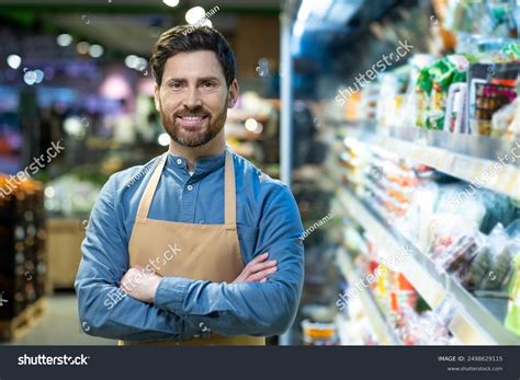 Confident Male Grocery Store Employee Standing Stock Photo 2498629115 | Shutterstock