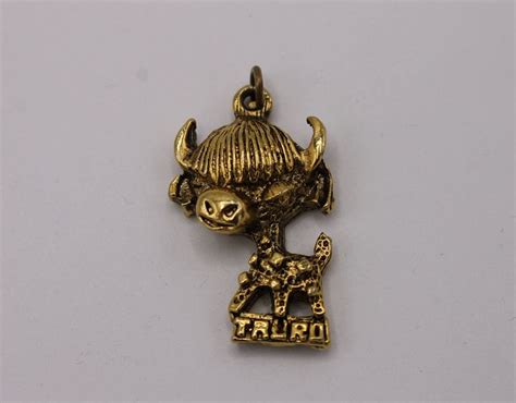 Vintage Gold Toned Taurus Zodiac Charm - Etsy | Vintage gold, Taurus ...