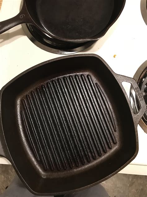 After further review.... the lodge grill pan does take a little bit ...