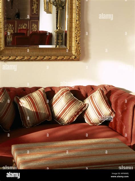 View of an antique mirror above a couch Stock Photo - Alamy