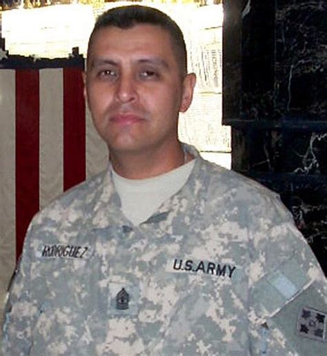 1st Sgt. Albert Rodriguez, first sergeant for the Headquarters Company ...