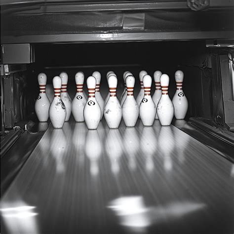 Image result for How Does a Bowling Pin Setting Machine Work