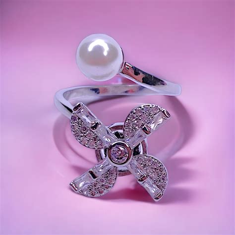 Elegant Windmill Configuration Pearl Ring For Ladies – Vatiyaana