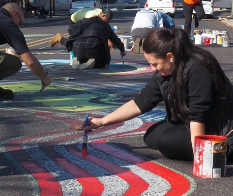 YWCA Painters Restore Street Art for Borough Block Party