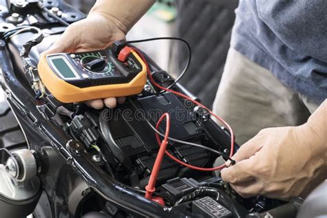 Image result for Using a Multimeter to Check Motorcycle Battery