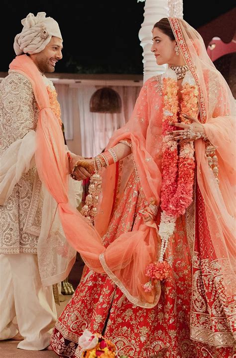 Bride: Nupur Sanon & Groom Stebin Ben in our Bespoke Ensemble – Manish ...