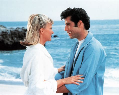 Olivia Newton-John and John Travolta on the beach in a scene from the ...