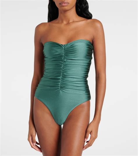 Yara ruched swimsuit in green - Jade Swim | Mytheresa