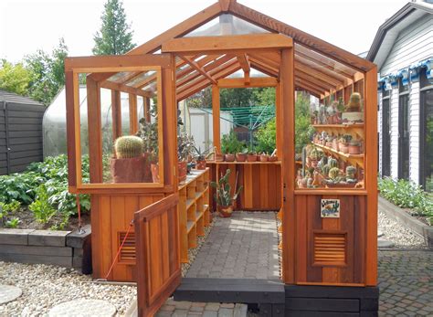 Cedar-Built Greenhouses- Dutch door - love! | Greenhouse plans, Diy ...