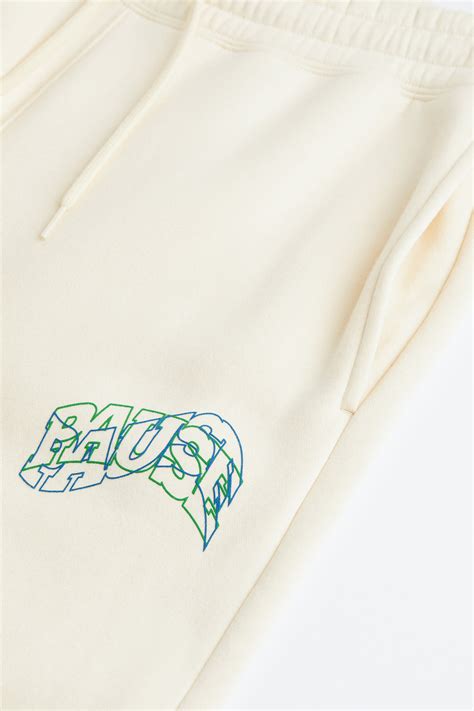 Relaxed Fit Joggers - Cream/Pause - Men | H&M IN